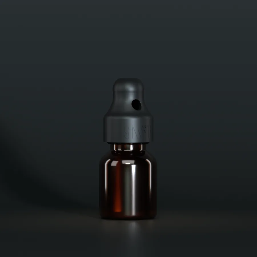 SN*F single sniffer cap, black, DIN 20, on a 10 ml amber glass bottle